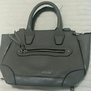 A CHRISTIAN SIRIANO HANDBAG.